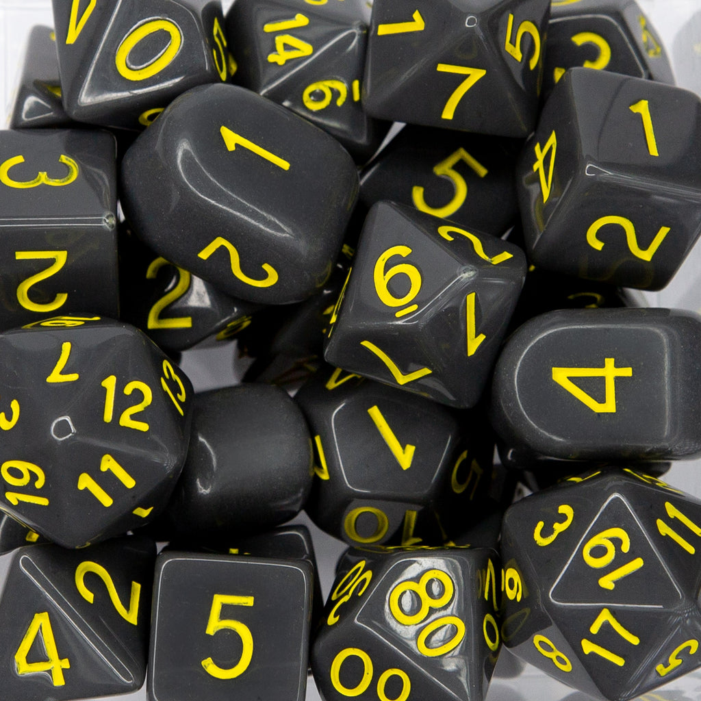 Dice opaque dark gray w/ yellow cluster